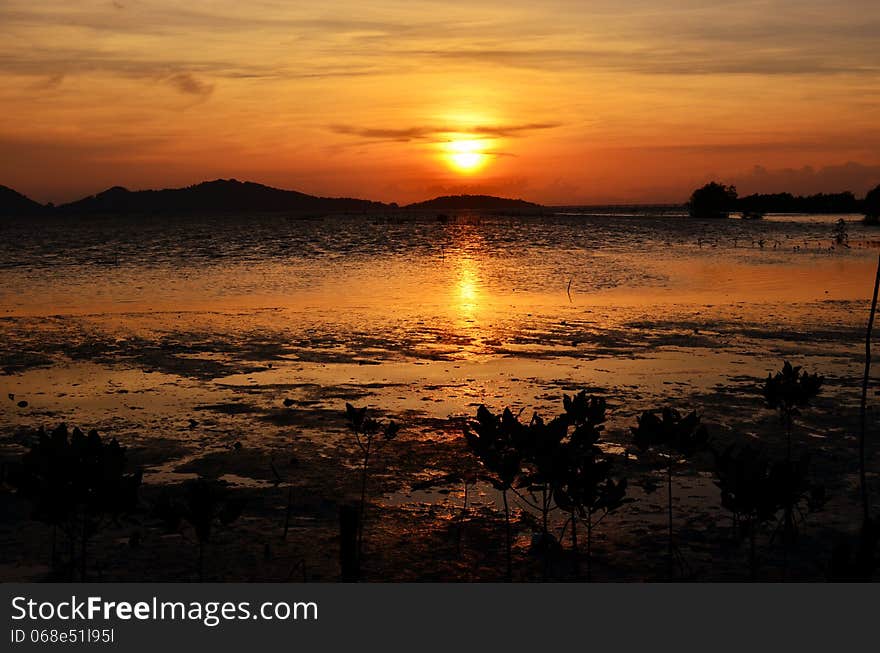 A sunset scene in Songkhla, Thailand.