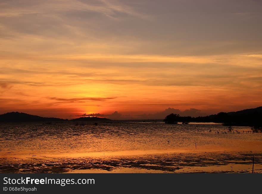 A sunset scene in Songkhla, Thailand.