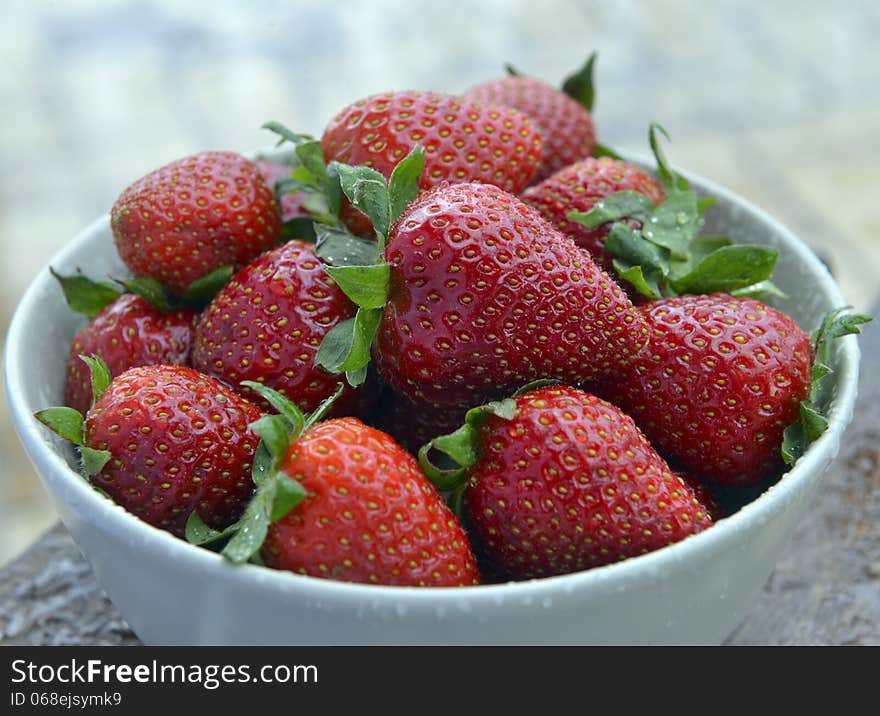 Strawberries in a bowl on the table