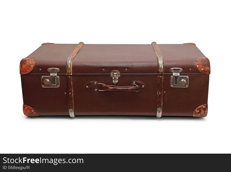 Old big suitcase isolated on a white background