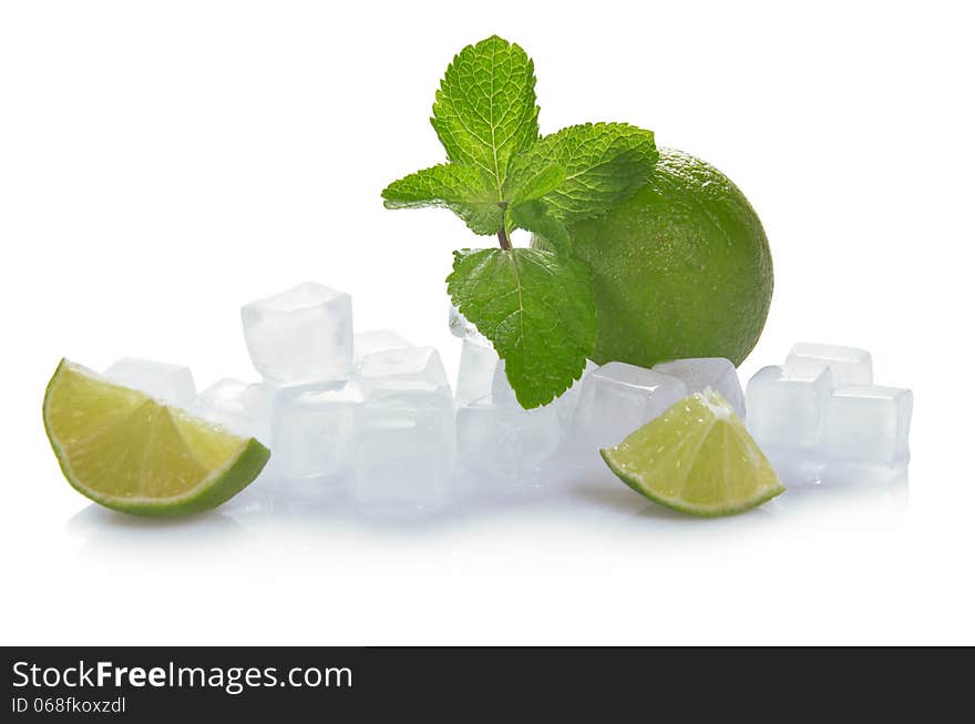 Ice cubes, lime, mint and the slices of a lime isolated on white. Ice cubes, lime, mint and the slices of a lime isolated on white