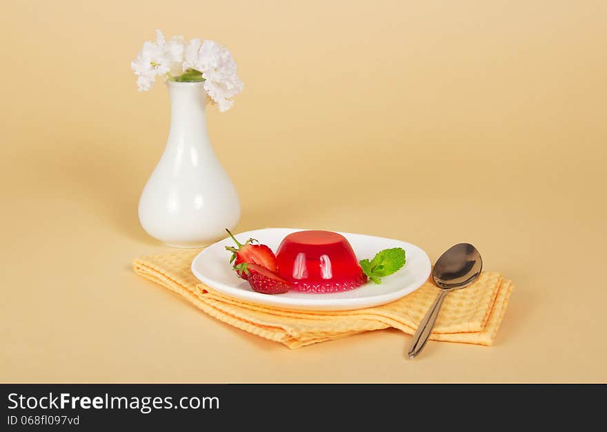 Plate With Jelly And Spoon On Napkin