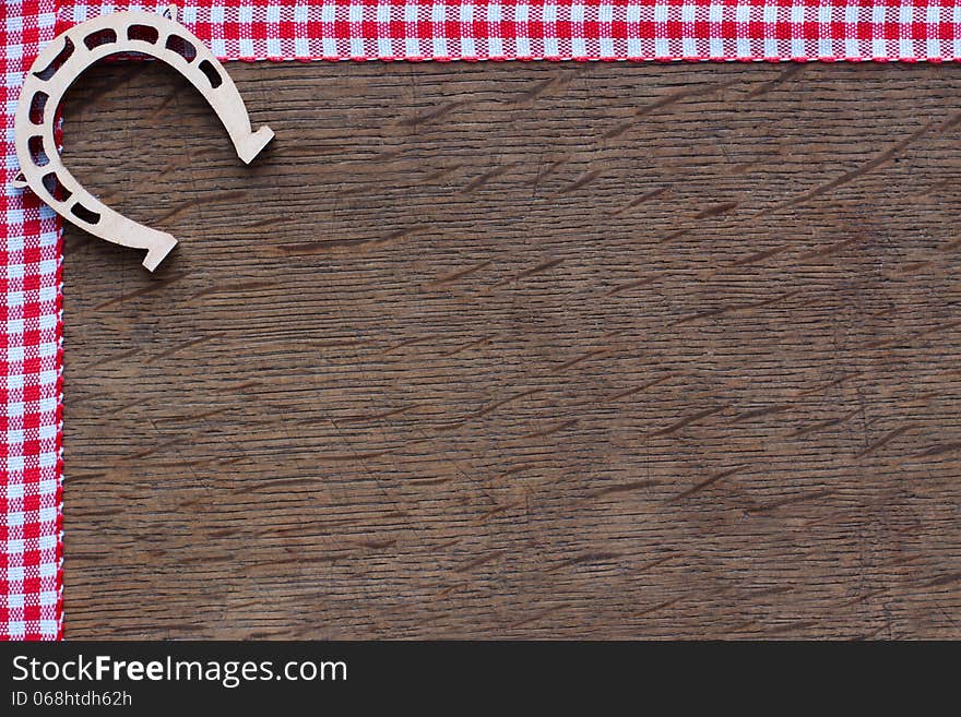 Horseshoe on a  wooden  background