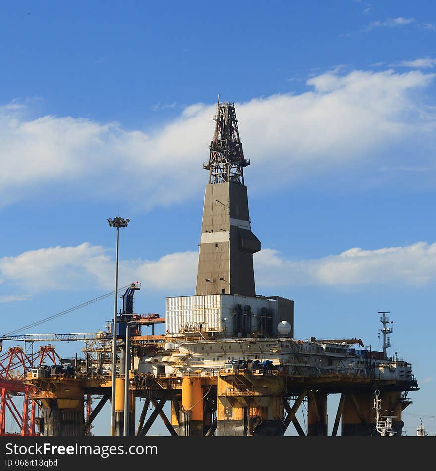 Semi Submersible Drilling Rig in the shipyard on sunny day