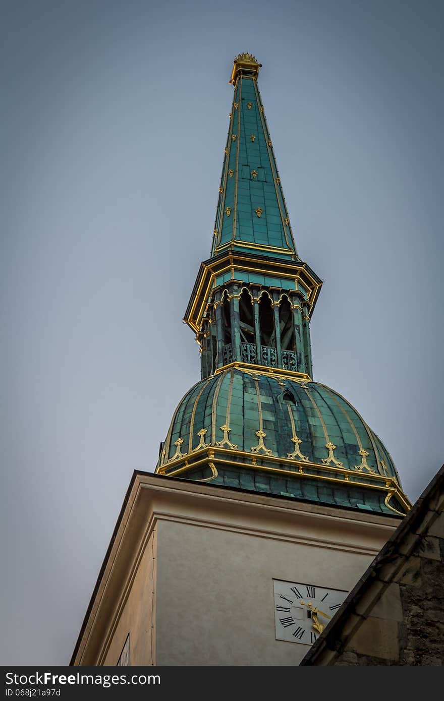 Evening light catching one of the ancient bell towers in Bratislava. Evening light catching one of the ancient bell towers in Bratislava