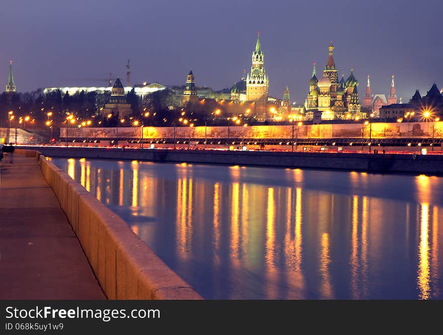 Moscow river embankment, illuminated by the lights of the Kremlin. Moscow river embankment, illuminated by the lights of the Kremlin.