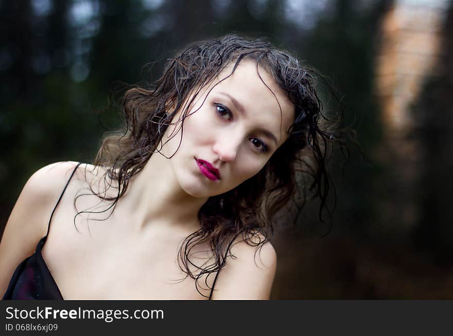 Woman s face under rain