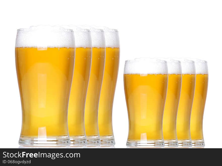 Tankards of lager with white background and level of support