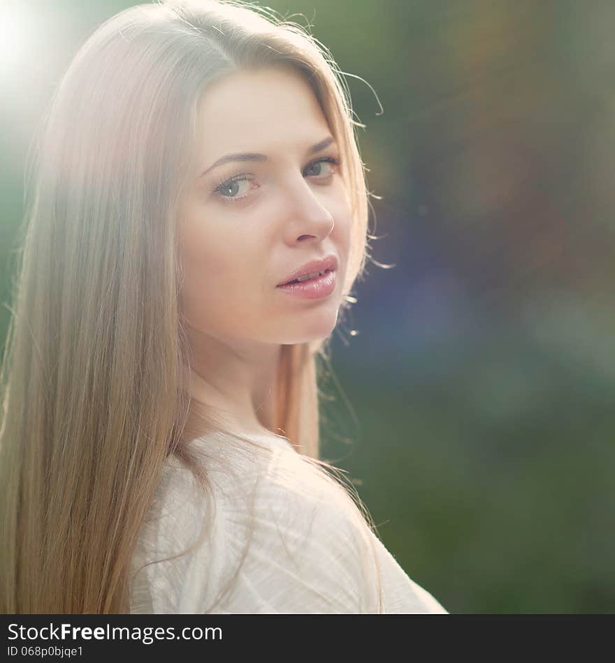 Portrait of a beautiful female model - outdoors