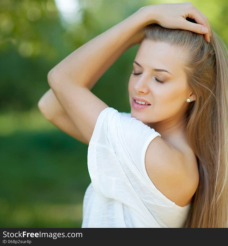 Beautiful woman face - closeup - outdoors