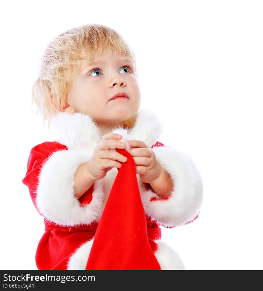 Portrait of a little girl dressed in Santa Claus, Christmas, gift package