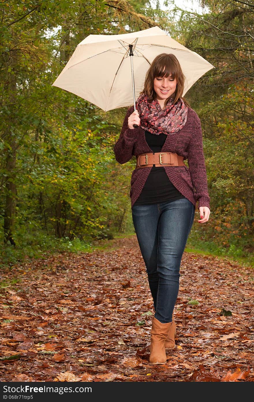 Young woman in the autumn at a cold november day. Young woman in the autumn at a cold november day