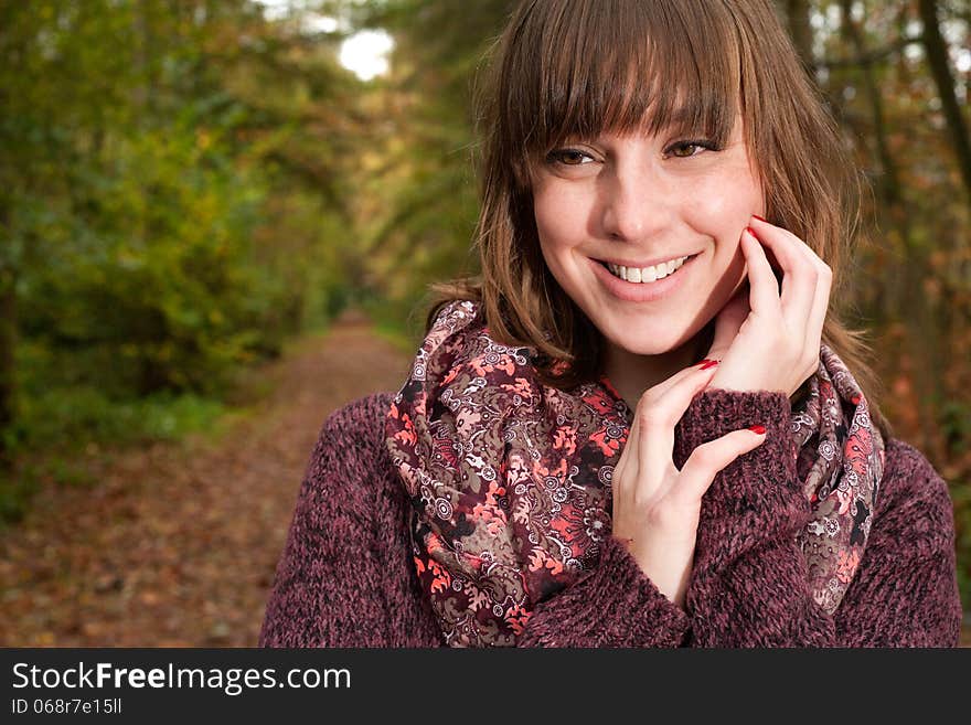 Young woman in the autumn at a cold november day. Young woman in the autumn at a cold november day