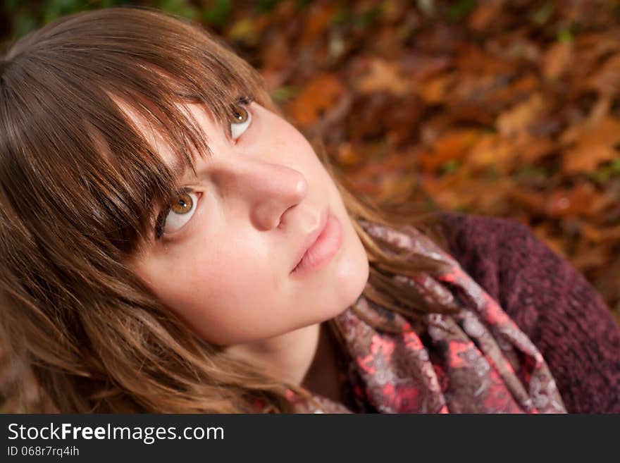 Young woman in the autumn at a cold november day. Young woman in the autumn at a cold november day