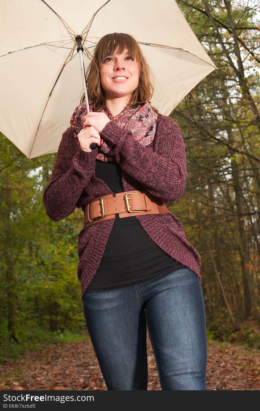 Young woman in the autumn at a cold november day. Young woman in the autumn at a cold november day