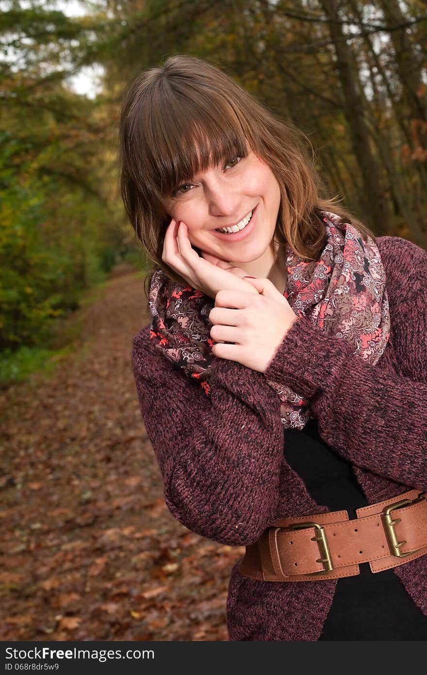 Happy girl with a path behind