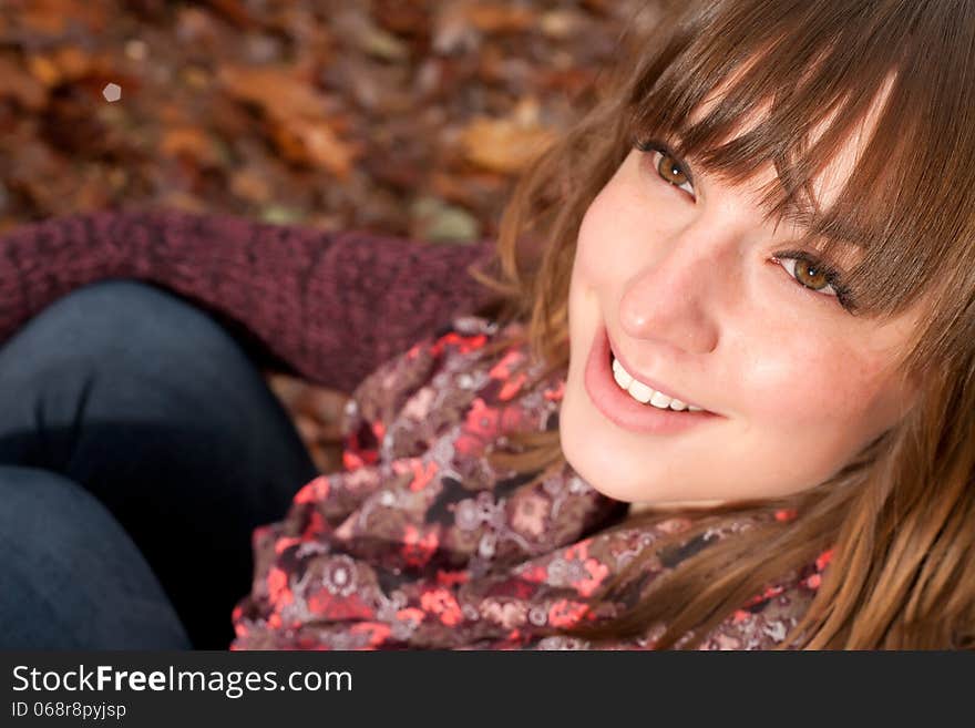 Young woman in the autumn at a cold november day. Young woman in the autumn at a cold november day