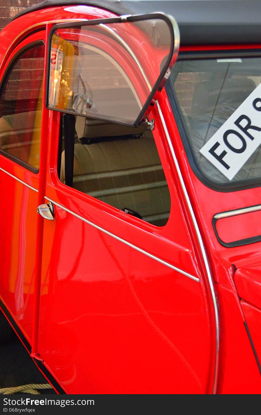 Image of a car window opened in an interesting way. Image of a car window opened in an interesting way