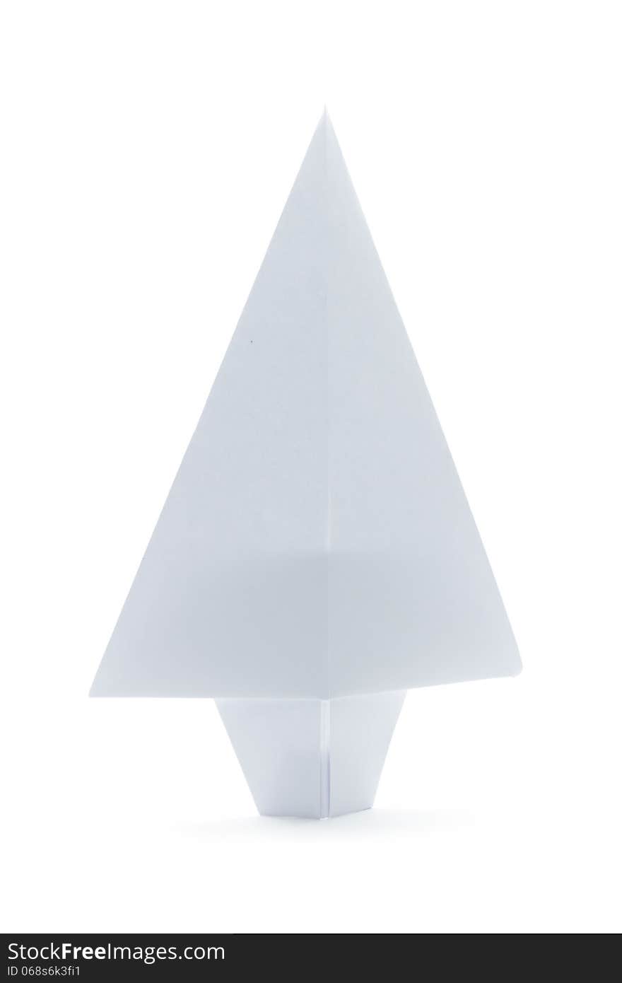 White paper origami christmas tree, isolated on white. White paper origami christmas tree, isolated on white