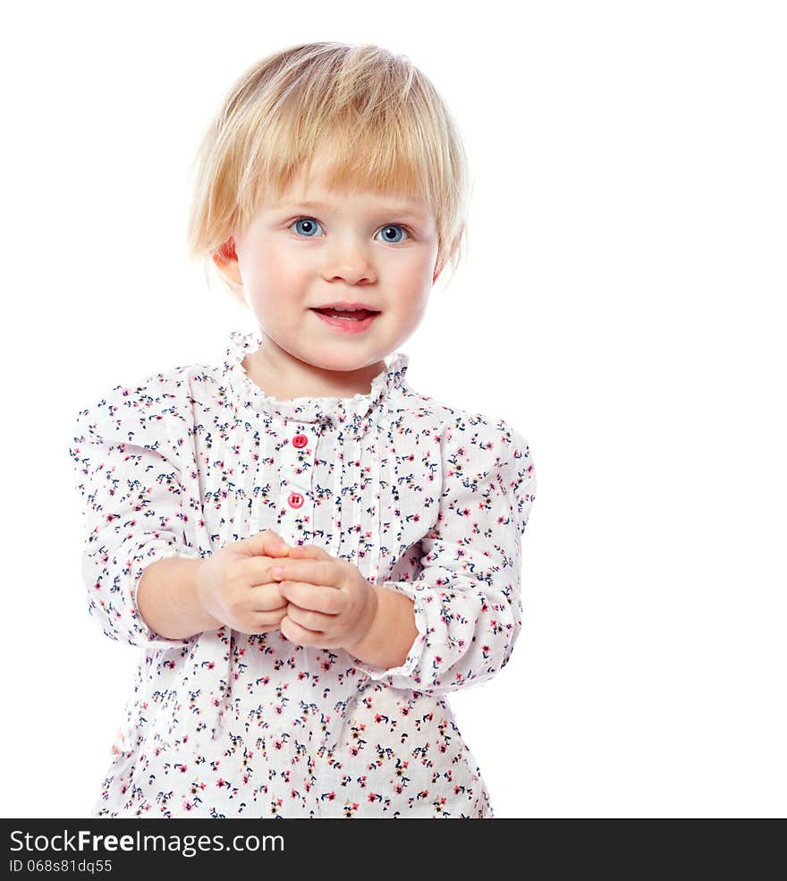 Portrait of a cheerful  little girl at home, in the dress, 1,5