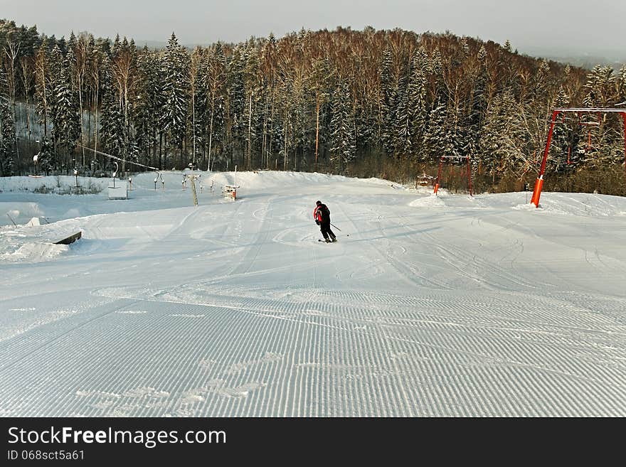 Skiing man from the snowy hill. Skiing man from the snowy hill.