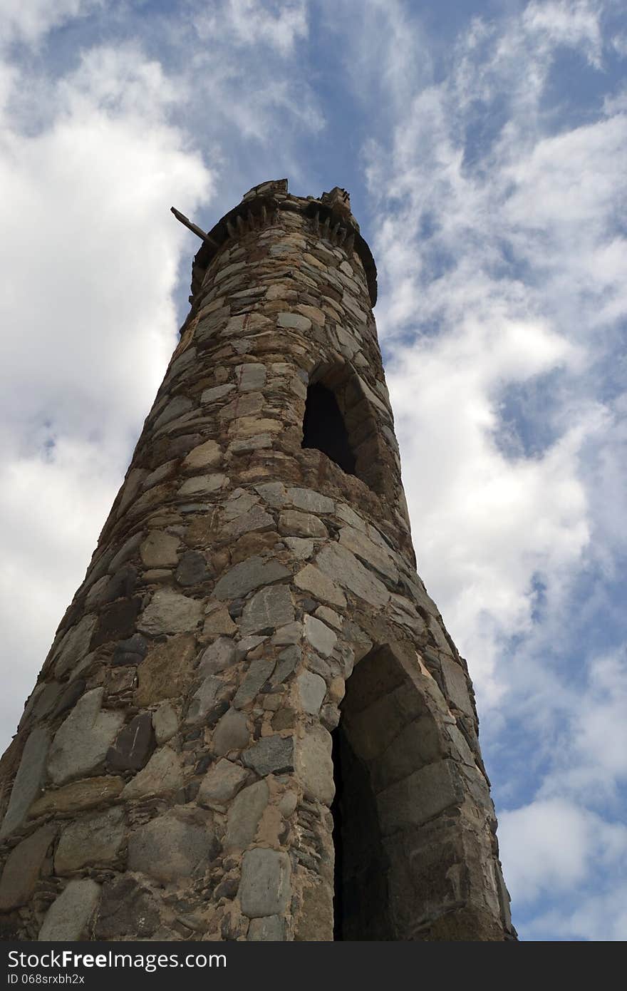 Stone castle with sky and clouds