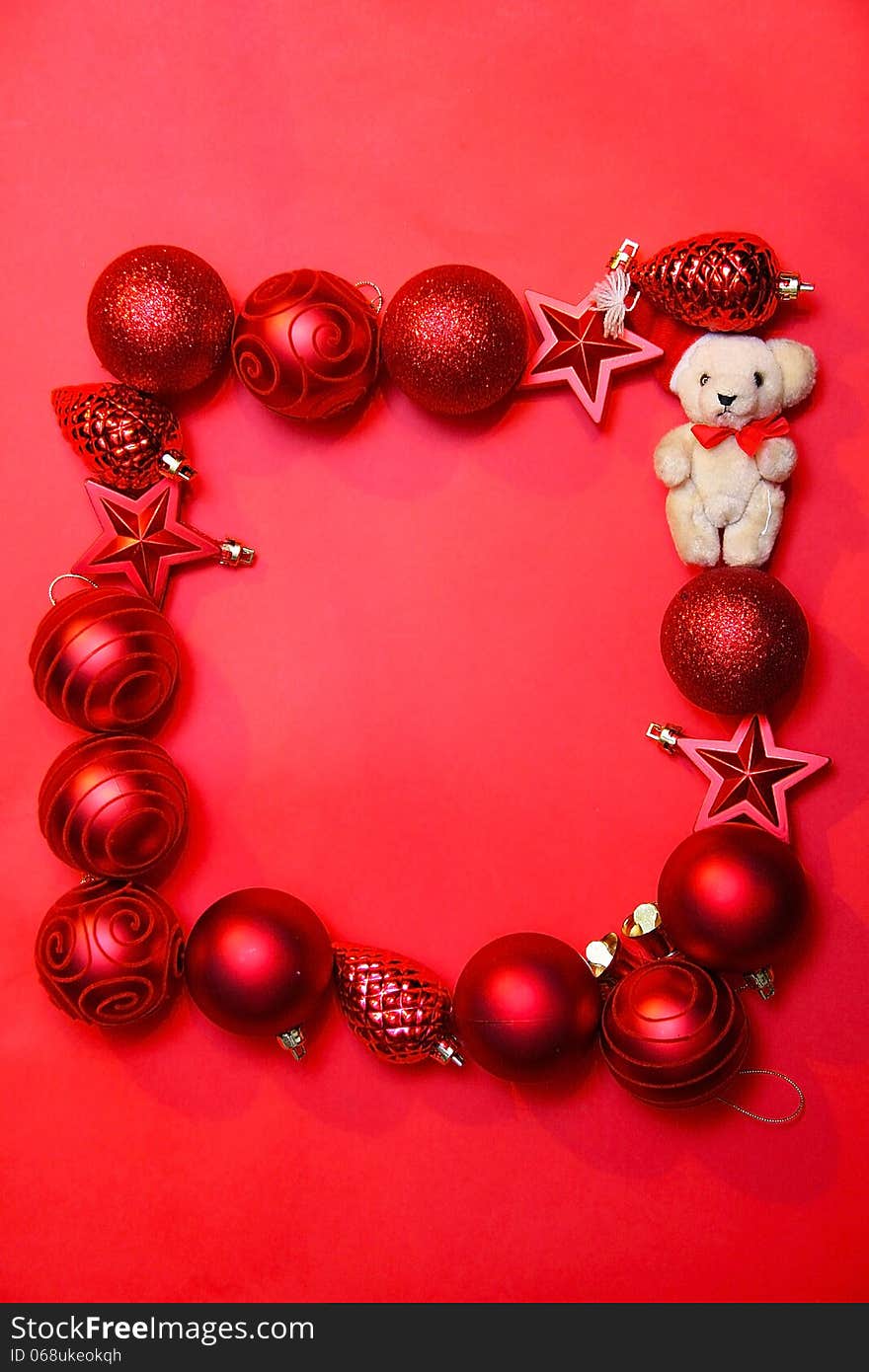 Red Cristmas decoration on red background. Red Cristmas decoration on red background.