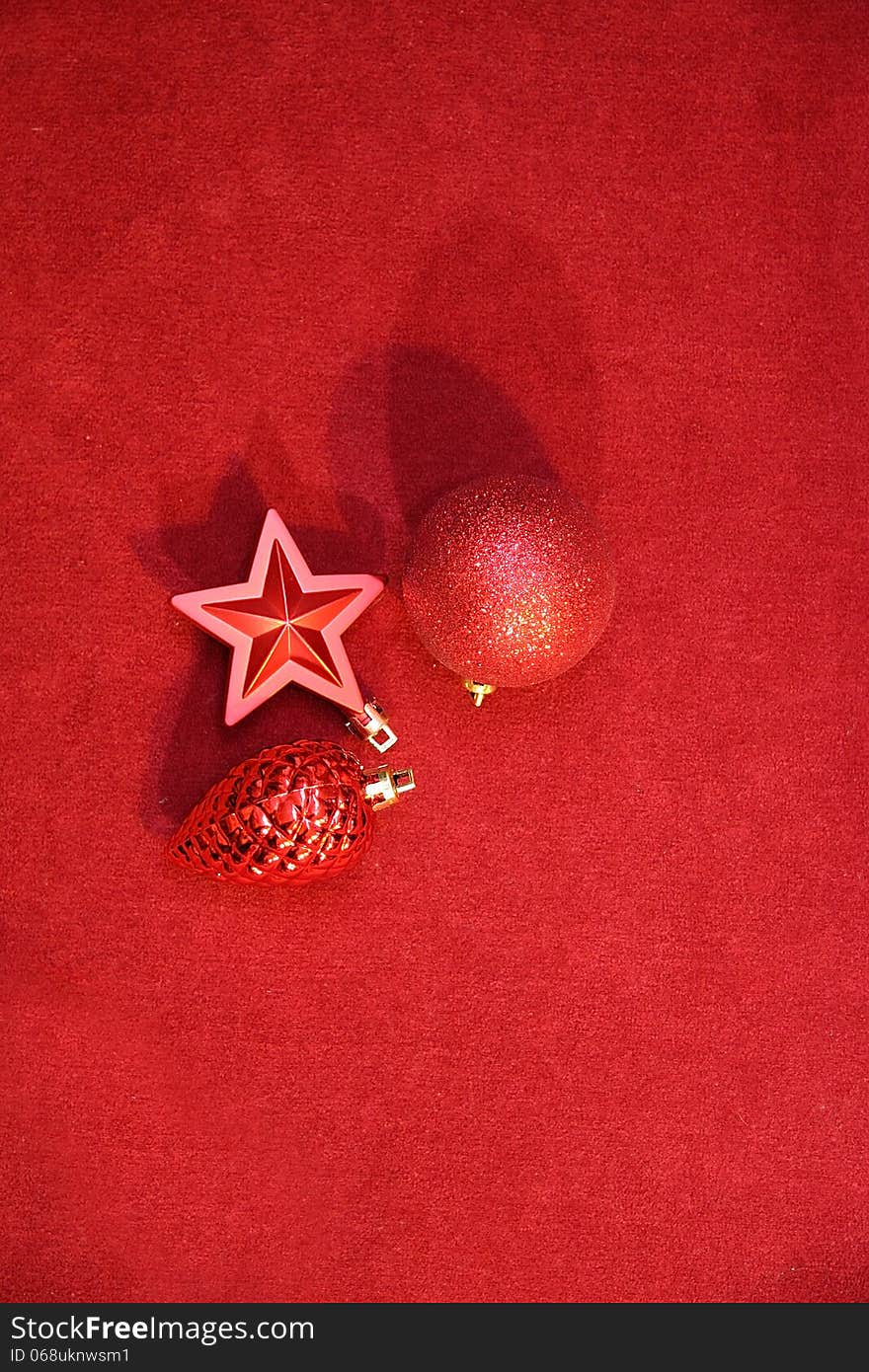 Red Cristmas decoration on red background. Red Cristmas decoration on red background.