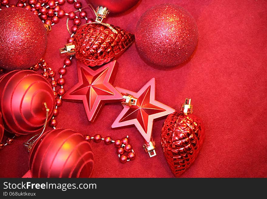 Red Cristmas decoration on red background. Red Cristmas decoration on red background.