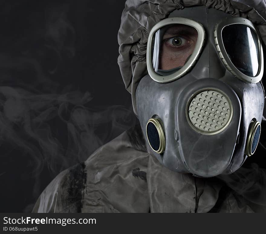 The Man In A Gas Mask In Smoke