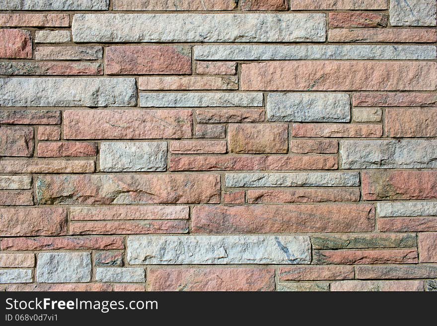 Brown brick wall with large blocks