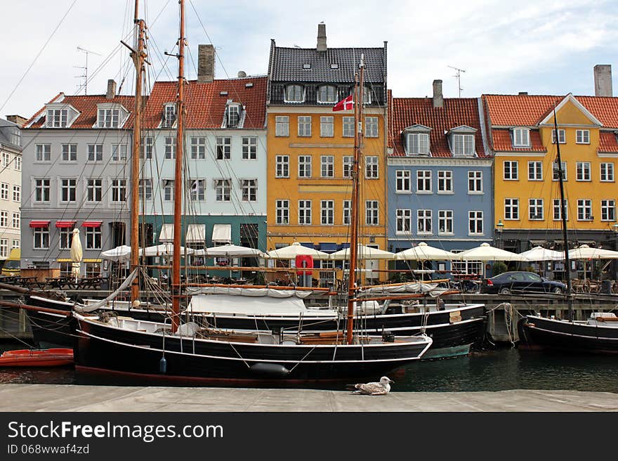 Nyhavn (New Harbor) is a 17th century waterfront, canal and entertainment district in Copenhagen, Denmark. Nyhavn (New Harbor) is a 17th century waterfront, canal and entertainment district in Copenhagen, Denmark.