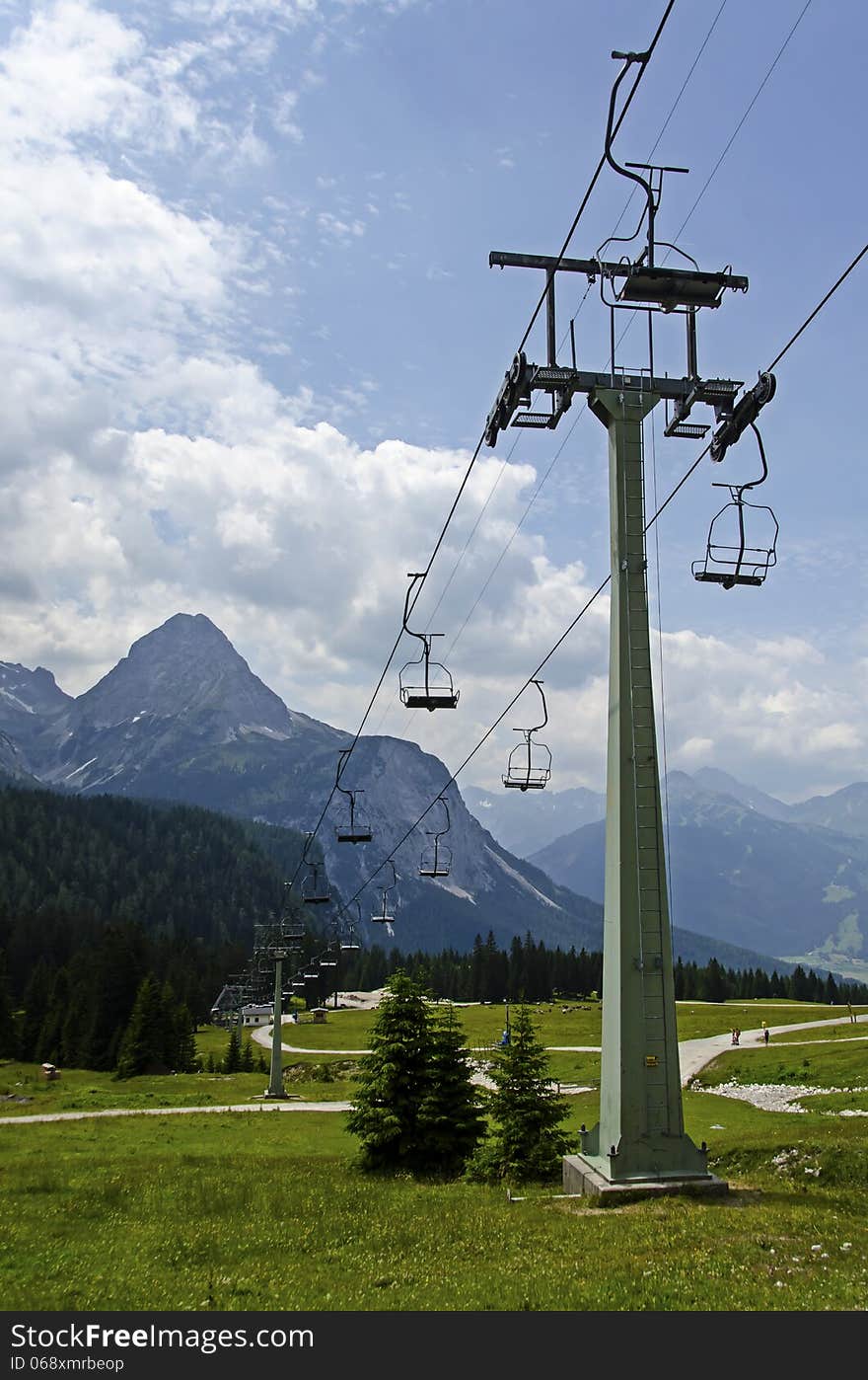 Funicular in the beautiful landscape and clouds of the Alps , Austria