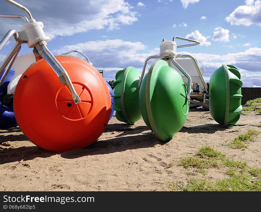 Pedalo on lake beach. summer outdoors. Pedalo on lake beach. summer outdoors