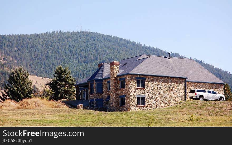 Stony home in Montana nearby mountain looking very impressive