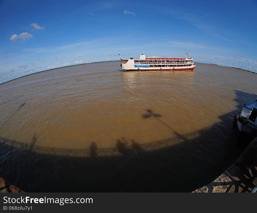 Boat in the Guajara bay, Amazon river delta, in Belem - Amazonian city - Brazil