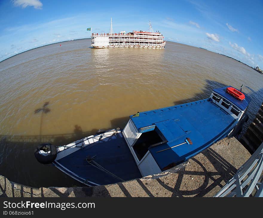 Boat in the Guajara bay, Amazon river delta, in Belem - Amazonian city - Brazil