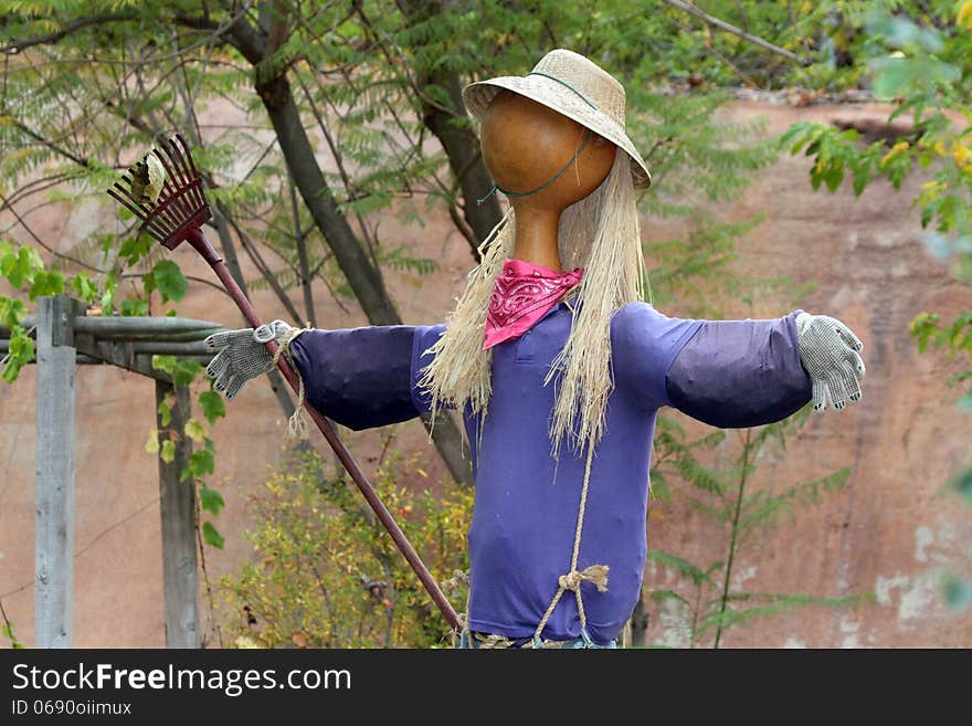 Home Made Garden Scare Crow With Straw Hat. Home Made Garden Scare Crow With Straw Hat