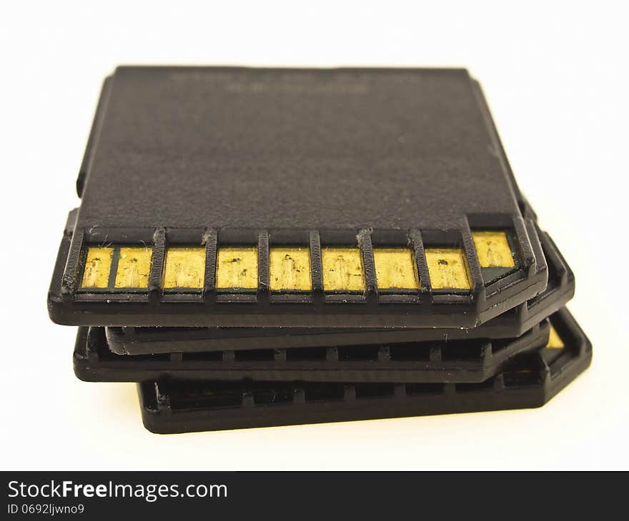 Stack of black SD card isolated on white background. Stack of black SD card isolated on white background