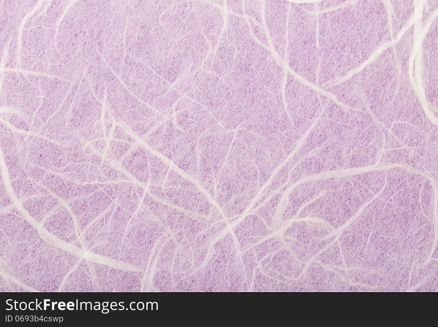 Seamless lilac background. Natural fabric close-up shot.