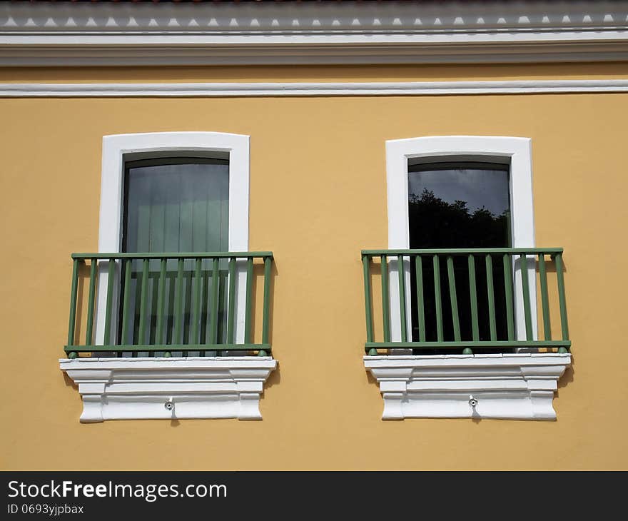 Ocher picturesque wall with two windows - Amazonia - Brazil