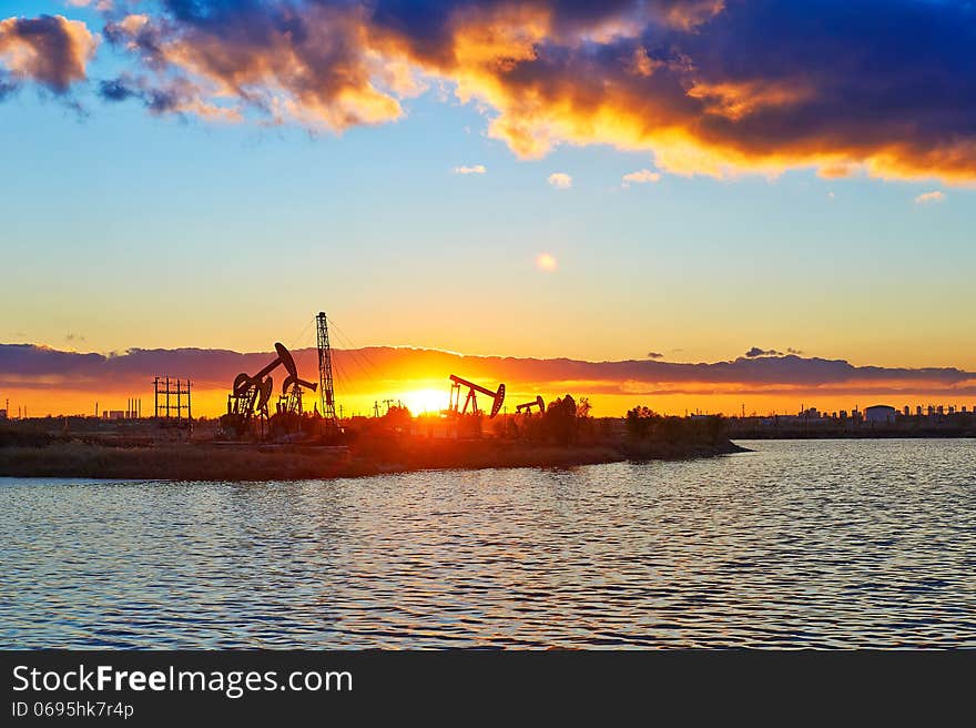 The oil fields and lake in the afterglow