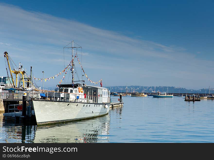 Brixham marina Devon with large boat and yachts Torbay England UK