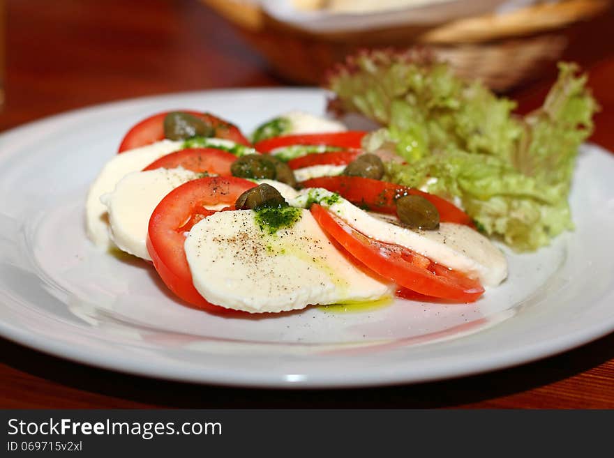 Salad With Tomatoes And Mozzarella Cheese.