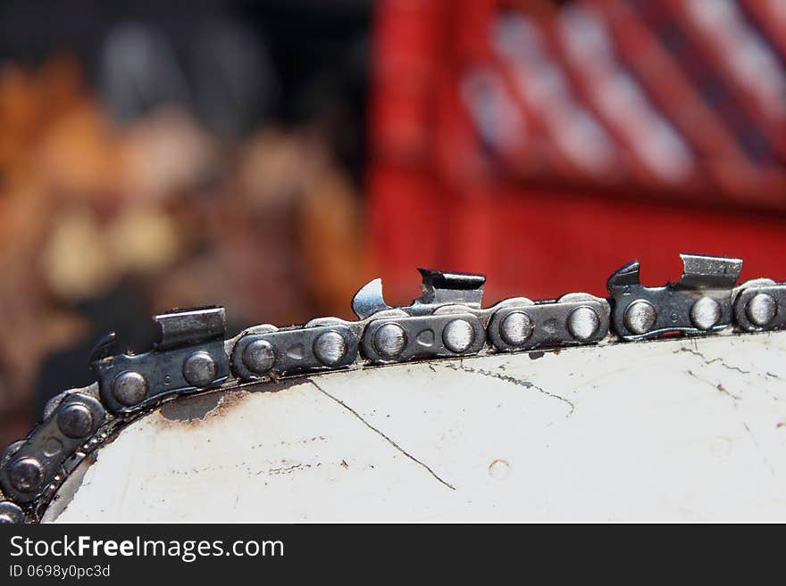 Closeup of well used but sharp chainsaw chain