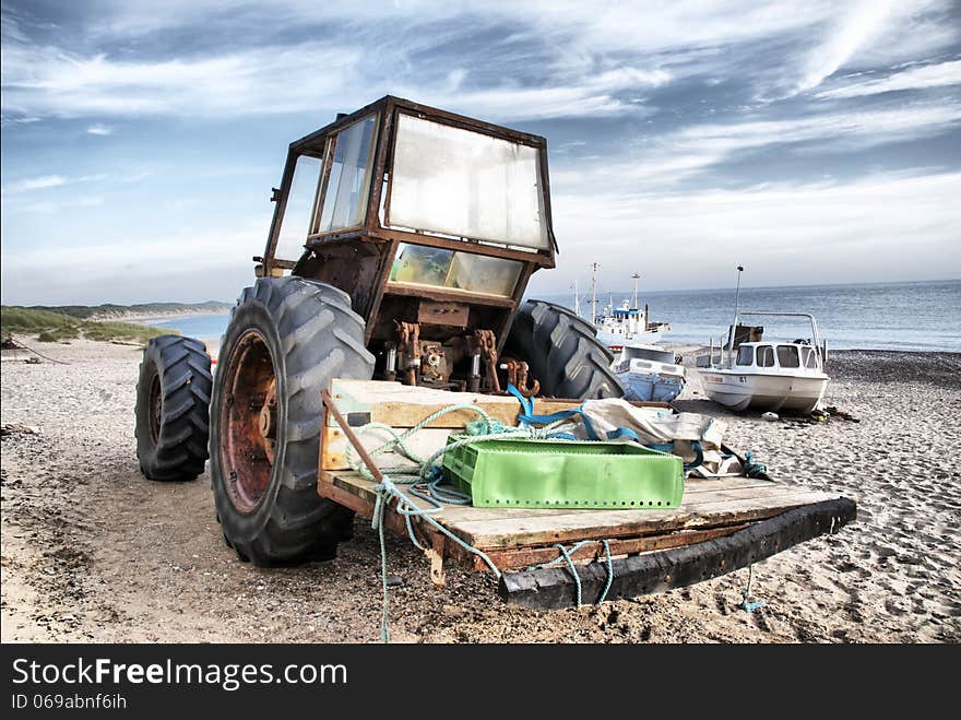 Tractor boat on the beach