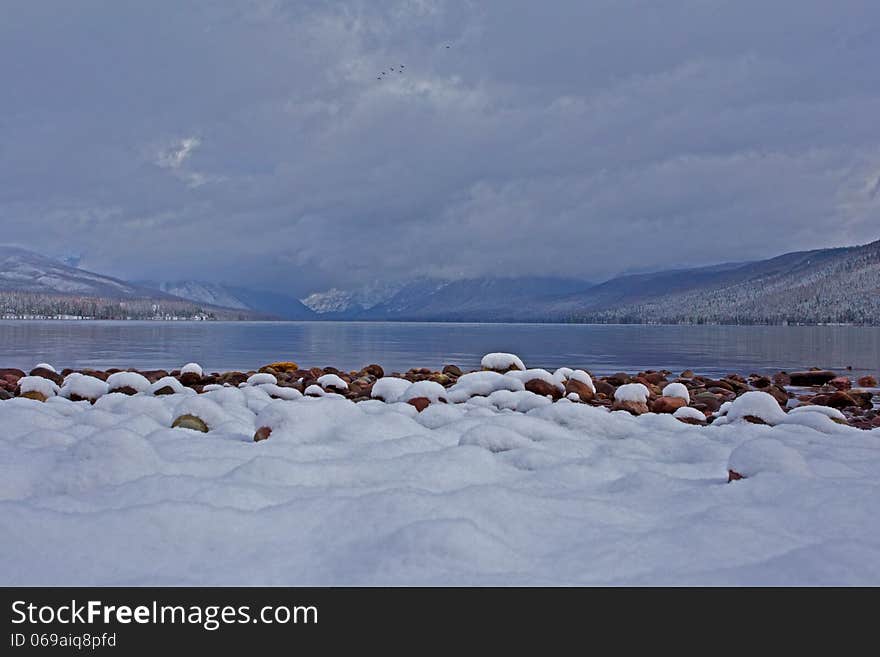 This image was taken at ground level at Lake McDonald in Glacier National Park, MT just after a snowfall. This image was taken at ground level at Lake McDonald in Glacier National Park, MT just after a snowfall.