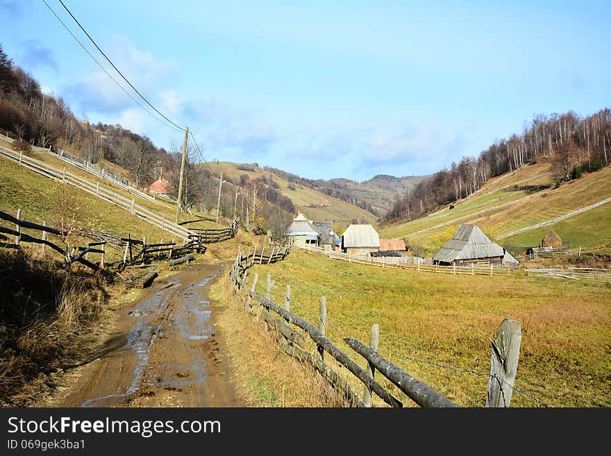 Country road with mud in autumn