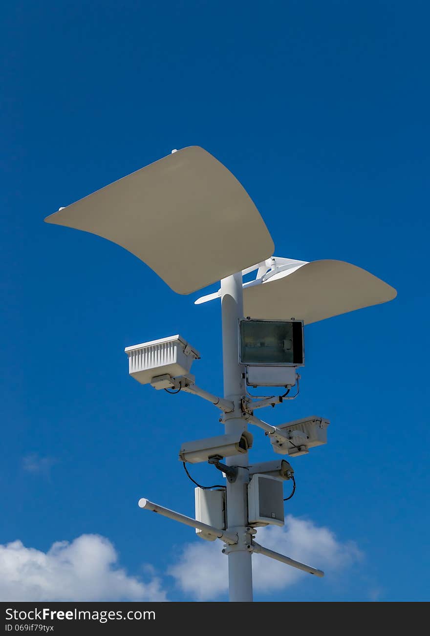 CCTV , Speaker and Sport Light with blue sky background