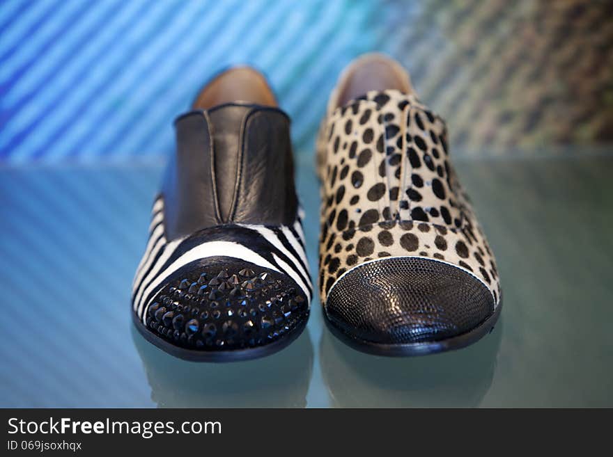 Ladies shoes in the shoe store. Selective focus.